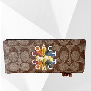 COACH SLIM WALLET IN SIGNATURE CANVAS‎ WITH COACH RADIAL RAINBOW